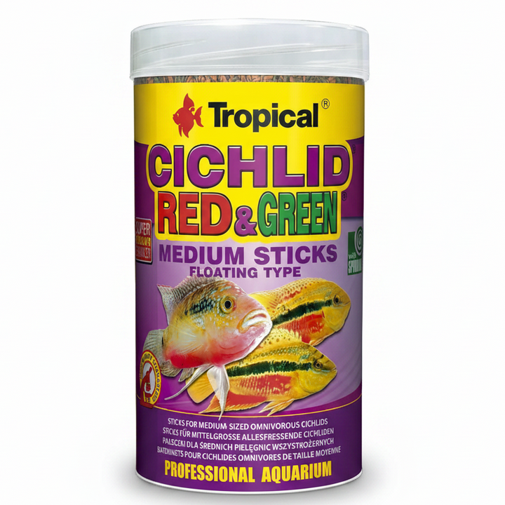 A cylindrical plastic jar of Tropical Cichlid Red &amp; Green Medium Sticks Floating Type fish food, featuring a yellow and purple label with illustrations of red and green cichlids.