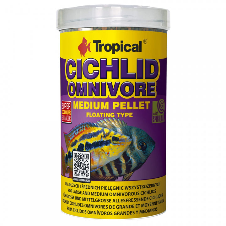 A cylindrical plastic jar of Tropical Cichlid Omnivore Medium Pellet floating type fish food, featuring a yellow and purple label with a striped cichlid fish illustration.