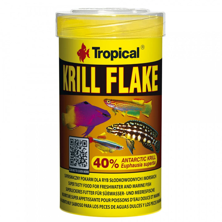 A cylindrical plastic canister of Tropical Krill Flake fish food, featuring a bright yellow label with illustrations of various aquarium fish and a QR code, set against a plain white background.