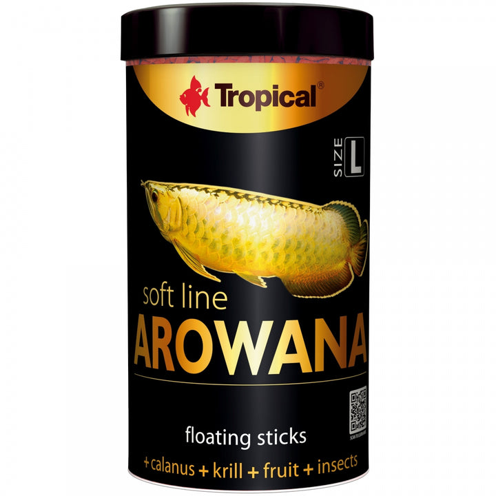 A cylindrical black container of Tropical Soft Line Arowana floating sticks fish food, featuring a gold and black label with an illustration of an arowana fish.