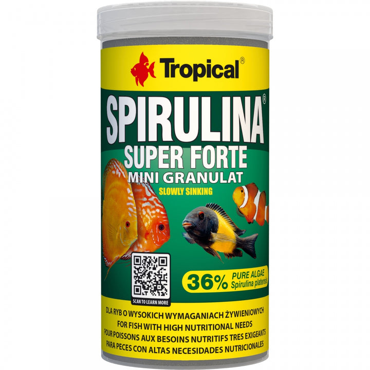 A cylindrical plastic jar of Tropical Spirulina Super Forte mini granulate fish food, featuring a yellow and green label with illustrations of various aquarium fish.