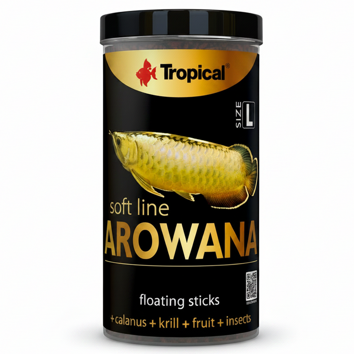 A cylindrical black container of Tropical Arowana soft line floating sticks fish food, featuring a gold and black label with an illustration of an arowana fish.