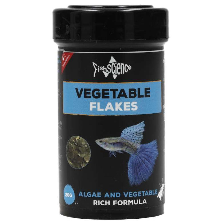 Container of 1st Science Vegetable Flakes for fish on a white background